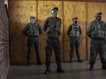 SAFRICA-ECONOMY-SECURITY Security guards of the private security company CORTAC stand guards while briefed by their officer at one of CORTAC base before starting their night shift in Johannesburg, on February 17, 2021. - South Africa has one of the world's largest private security industries, employing more personnel than the police, according to the national Private Security Industry Regulatory Authority.
The sector creates work for more than two million people in a country where unemployment stands over 30 percent. (Photo by Michele Spatari / AFP)